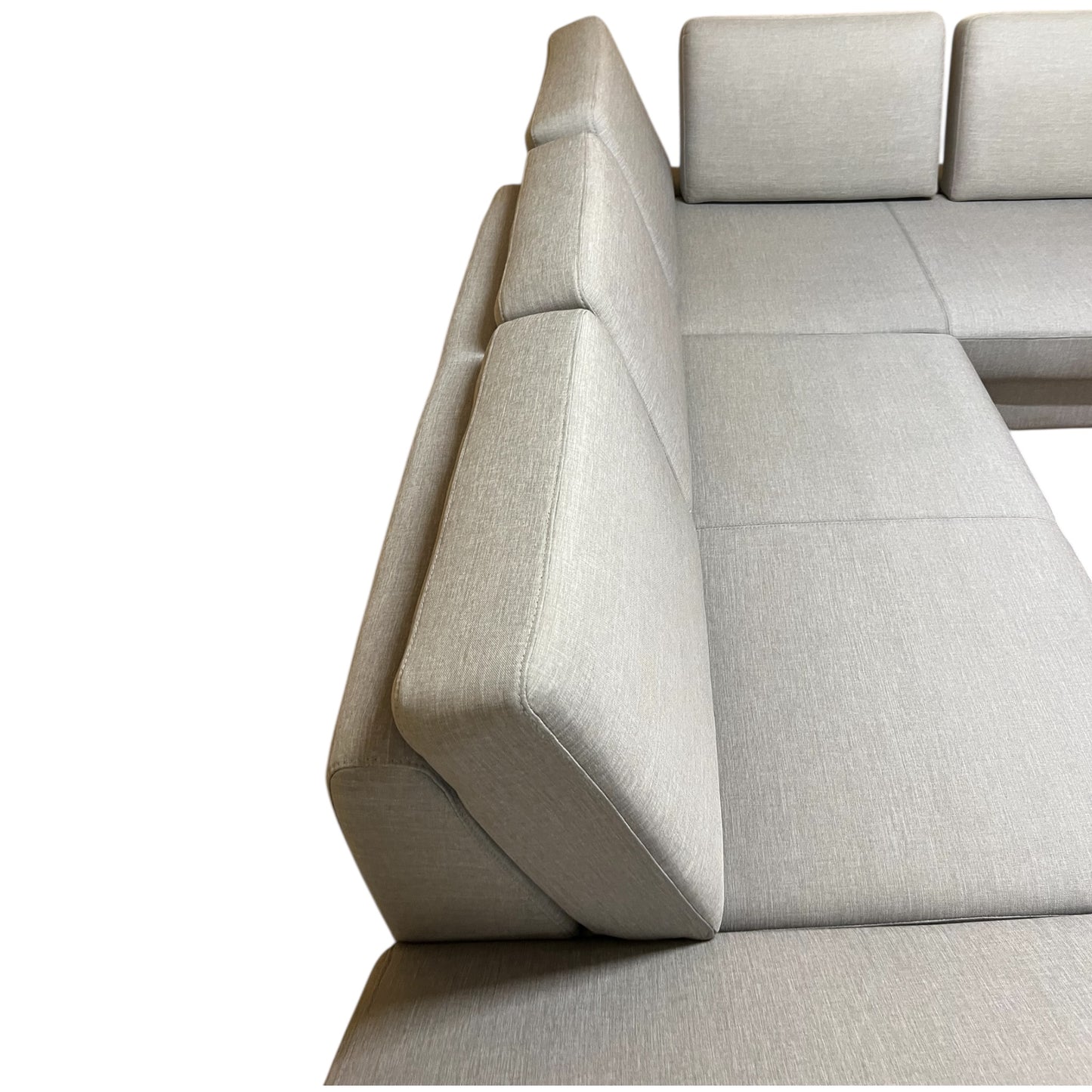 Graues Ecksofa mit verstellbaren Armlehnen. Art.-Nr. 549